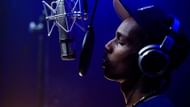 The catchy music adds to the overall narrative of Highest 2 Lowest (Image via Apple Studios)